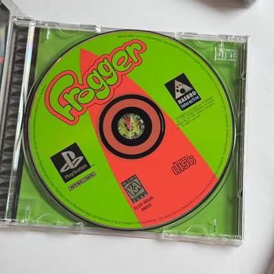 LOT 204V: Sony PlayStation 2 DDR Disney & PS1 Games: Frogger, Crash Bandicoot 2 (holo cover), Soviet Strike, 007 & More