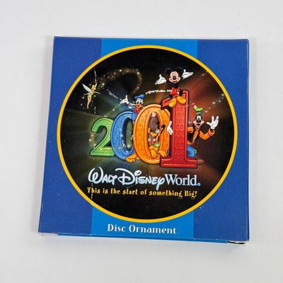 LOT 74P: Walt Disney World 2001 Collection: NIP Matchbox Bus, 2 0 0 1 Trading Pins (2 sets), Lanyards, Disc Ornament & Medallion