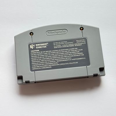 LOT 205V: Vintage Nintendo N64 Video Game Consoles: 007, Wayne Gretzky & More