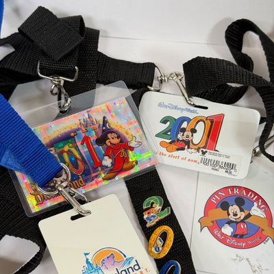 LOT 74P: Walt Disney World 2001 Collection: NIP Matchbox Bus, 2 0 0 1 Trading Pins (2 sets), Lanyards, Disc Ornament & Medallion