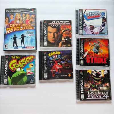LOT 204V: Sony PlayStation 2 DDR Disney & PS1 Games: Frogger, Crash Bandicoot 2 (holo cover), Soviet Strike, 007 & More