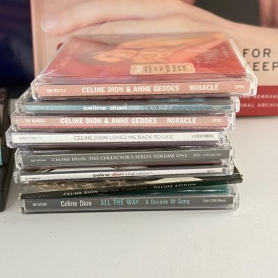 LOT 90A: Celine Dion Collection: For Keeps Book, Concert Book, Tapes, CDs & DVDs