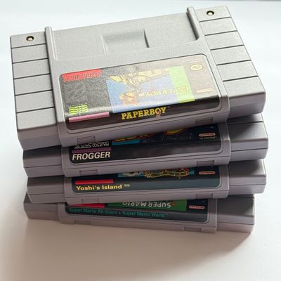 LOT 206V: Vintage Super Nintendo Video Game Cartridges: Super Mario All Stars / Super Mario World, Frogger, Paperboy & Yoshi's...