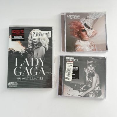 LOT 91A: Paws Up! Lady Gaga Collection: NIP DVD, CDs, Singing Toothbrush & Gaga's Workshop Souvenirs
