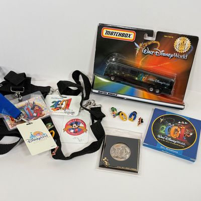 LOT 74P: Walt Disney World 2001 Collection: NIP Matchbox Bus, 2 0 0 1 Trading Pins (2 sets), Lanyards, Disc Ornament & Medallion