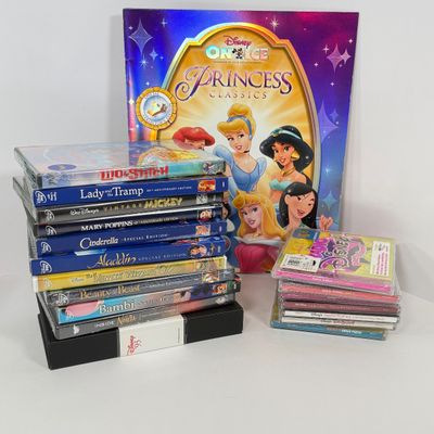LOT 79A: Disney CDs, On Ice Princess Classics Program & Disney DVDs: Cinderella, Lilo & Stitch, Aladdin, Beauty and the Beast,...