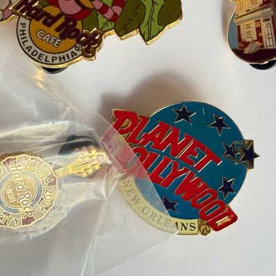 LOT 178J: Collectible Pins: Outback, Universal Studios, Hard Rock Cafe & More