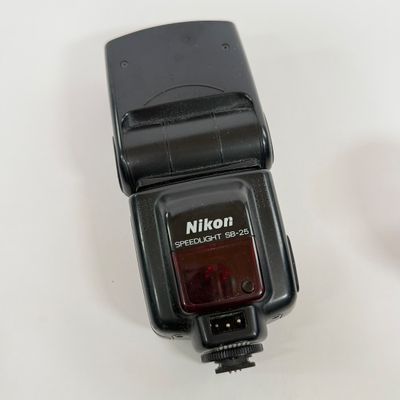 LOT 70A: Nikon Speedlight SB-25 External Flash, Nikon DX Lenses: 18-55mm & 55-200mm, Nikon Camera Bag & More