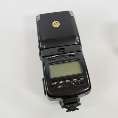 LOT 70A: Nikon Speedlight SB-25 External Flash, Nikon DX Lenses: 18-55mm & 55-200mm, Nikon Camera Bag & More