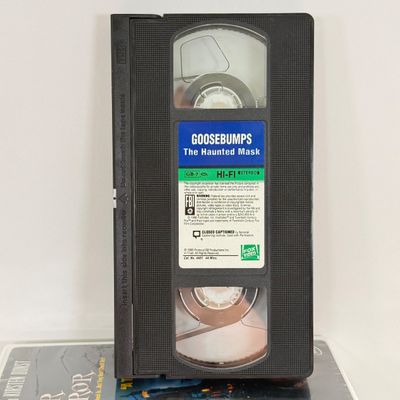 LOT 85A: Spooky Collection: Variety of Halloween Sounds, Goosebumps VHS & Audio Book Tapes, DVDs & More
