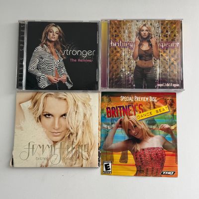 LOT 87A: Britney Spears Collection: Concert Programs, Framed & Unframed Posters, CDs, DVDs & More