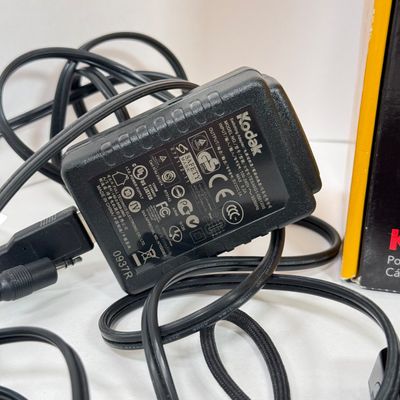 LOT 71A: Kodak Zi8 Pocket Video Camera w Box, Manuals, Charger & Cords
