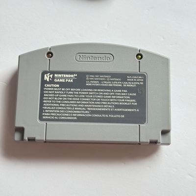 LOT 205V: Vintage Nintendo N64 Video Game Consoles: 007, Wayne Gretzky & More