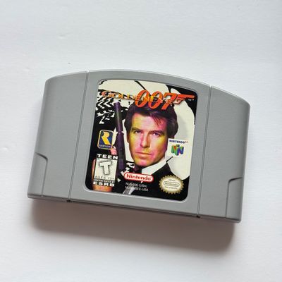 LOT 205V: Vintage Nintendo N64 Video Game Consoles: 007, Wayne Gretzky & More