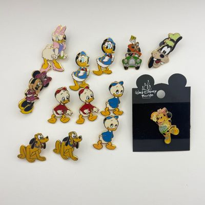 LOT 117P: WDW Trading Pins: Donald & Family, Goofy, June Birthstone Minnie, Pluto