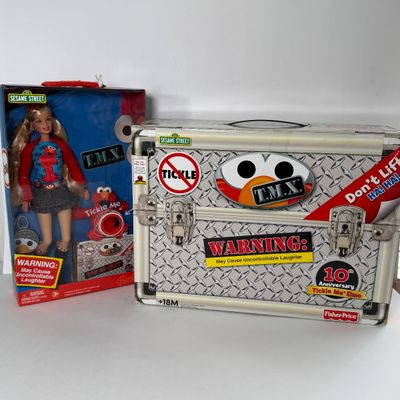 LOT 64A: NIB Sesame Street TMX Tickle Me Elmo 10th Anniversary Toy & TMX Tickle Me Elmo Barbie NRFB