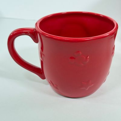LOT 75A: Disney Mickey & Minnie Mouse Red Mugs (4) & Stainless Steel Mickey Cutout Flatware: 11 Butter Knives, 12 Tablespoons...