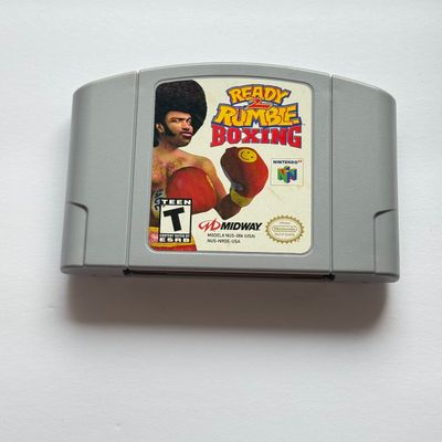 LOT 205V: Vintage Nintendo N64 Video Game Consoles: 007, Wayne Gretzky & More