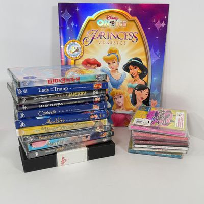 LOT 79A: Disney CDs, On Ice Princess Classics Program & Disney DVDs: Cinderella, Lilo & Stitch, Aladdin, Beauty and the Beast,...