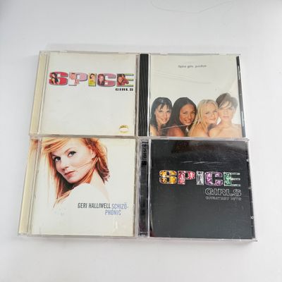 LOT 88A: Spice Up Your Life! Spice Girls Collection: Tapes, CDs, Toy Figures, Spice World Tour Book & Mini Pocket Baby Spice Books