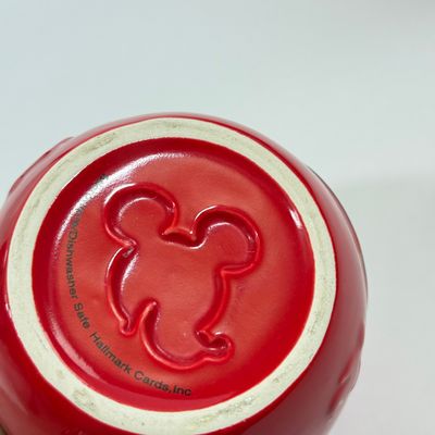 LOT 75A: Disney Mickey & Minnie Mouse Red Mugs (4) & Stainless Steel Mickey Cutout Flatware: 11 Butter Knives, 12 Tablespoons...