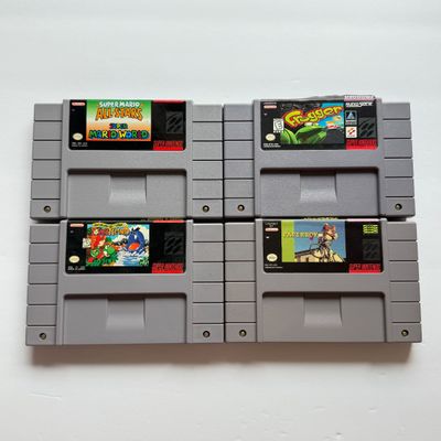 LOT 206V: Vintage Super Nintendo Video Game Cartridges: Super Mario All Stars / Super Mario World, Frogger, Paperboy & Yoshi's...