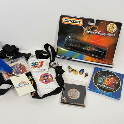 LOT 74P: Walt Disney World 2001 Collection: NIP Matchbox Bus, 2 0 0 1 Trading Pins (2 sets), Lanyards, Disc Ornament & Medallion
