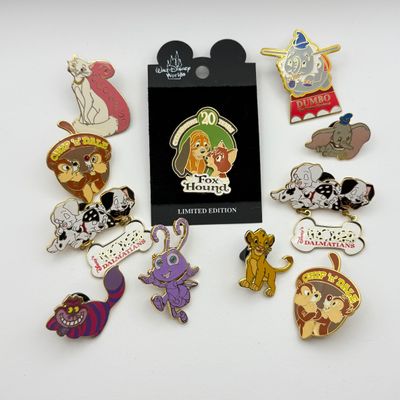 LOT 119P: WDW Animal Trading Pins: LE3500 The Fox and the Hound 20th Anniversary, Cheshire Cat, Simba, Aristocats Duchess, Chip...