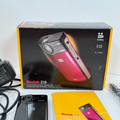 LOT 71A: Kodak Zi8 Pocket Video Camera w Box, Manuals, Charger & Cords