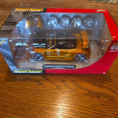 Jada Import Racer! Toyota MR2 Spyder 1:24 Die-Cast Model – Metallic Gold – New in Box