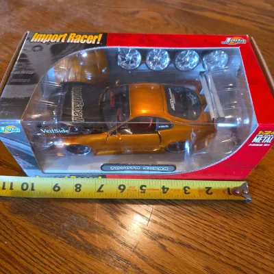 Jada Import Racer! VeilSide Toyota Supra 1:24 Die-Cast Model Car – Metallic Orange – New in Box
