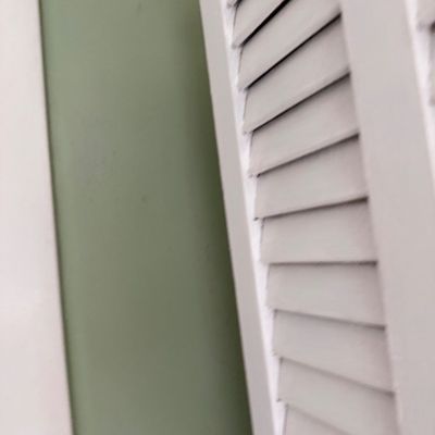 Wooden Storage Cabinet with Louvered Shuttle Style Doors