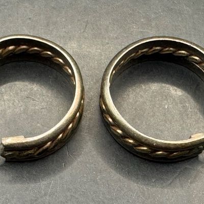 Sale Photo Thumbnail #229: This set includes a cuff bracelet and a pair of earrings. Each piece features gold-filled accents. Each is marked “925, 1/20 GF.” The cuff measures 2.25” wide. The total weight is 23.79 grams. [AG]