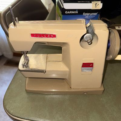 Vintage working toy sewing machine 