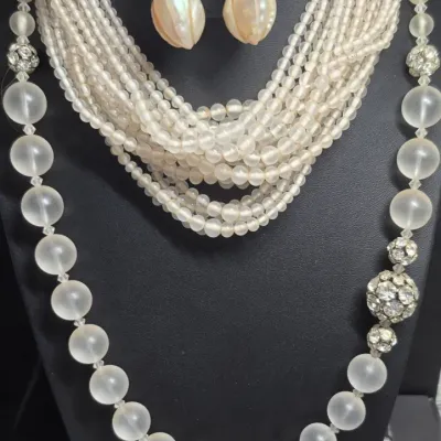 Sale Photo Thumbnail #27: Vintage creamy glass beaded Necklace & Large glass bead Necklace & Earrings
> 2 fashionable necklaces and Earring set
> multi strand frosted glass beads, w/ 4 strand clasp
> large frosted necklace has 3 rhinestone beads random spaced
> earrings are mop sh