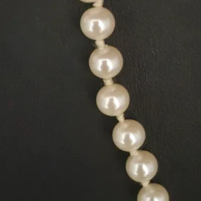 Sale Photo Thumbnail #53: Freshwater Pearls knotted & Earrings to coord.
> necklace is knotted, .25 size pearly, and a great clasp shown
> earrings Napier ~ 2 different size pearly with screw post closure
> WGT. 38 gr.  ///// necklace size; 16" closed