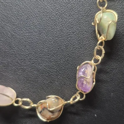 Sale Photo Thumbnail #65: Multi Gemstone, Amethyst, jade, agate, ~ gold gilt wire wrap Vintage Necklace & Cloisonne Earrings
> necklace is 14" long closed with lobster claw clasp
> 2 pair of Cloisonne earrings w/ clasp backs
All in very fine condition