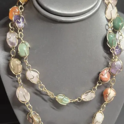 Sale Photo Thumbnail #70: Multi Gemstone, Amethyst, jade, agate, ~ gold gilt wire wrap Vintage Necklace & Cloisonne Earrings
> necklace is 14" long closed with lobster claw clasp
> 2 pair of Cloisonne earrings w/ clasp backs
All in very fine condition
