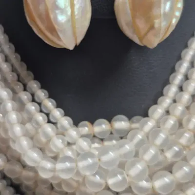 Sale Photo Thumbnail #31: Vintage creamy glass beaded Necklace & Large glass bead Necklace & Earrings
> 2 fashionable necklaces and Earring set
> multi strand frosted glass beads, w/ 4 strand clasp
> large frosted necklace has 3 rhinestone beads random spaced
> earrings are mop sh