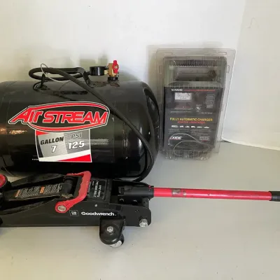 Exide 12 Volt Charger, 2 Ton Jack And 7 Gal Air Tank