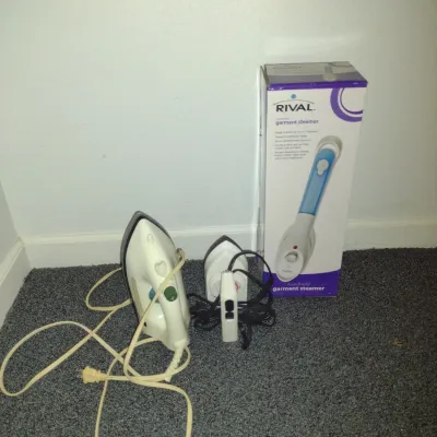 Iron, Ironing Board, and Garment Steamer