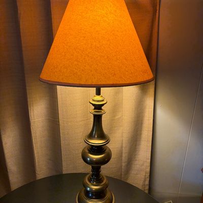 Sale Photo Thumbnail #272: Set of 2 brass lamps. Off white lamp shades. Both in good working order.