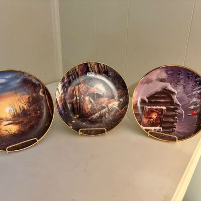 Sale Photo Thumbnail #424: Lot includes 3 decorative plates featuring wildlife/ landscape photos.