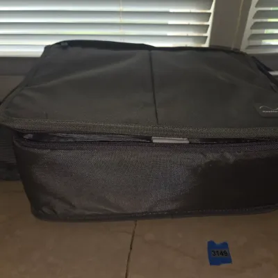 Sale Photo Thumbnail #152: This case is not designed to carry ammo however,  the seller did store nearly all the ammo available in this sale within it.  
Zip closer works as designed
