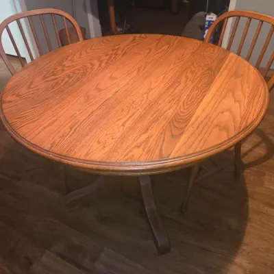 Sale Photo Thumbnail #43: Comes with four matching chairs. Some minor scuffs from use can be seen on the tabletop.