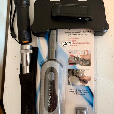 Sale Photo Thumbnail #378: Lot of 4 accessories including-
1- Otter box phone case 
2- Portable flashlights 
1- Gas detector (new in package)