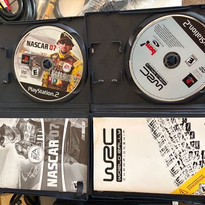 Sale Photo Thumbnail #328: Lot of 4 PS2 games in cases.