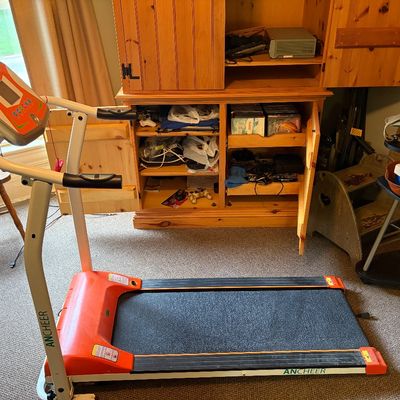 Sale Photo Thumbnail #287: Electric treadmill in good working order. Orange and white in color.