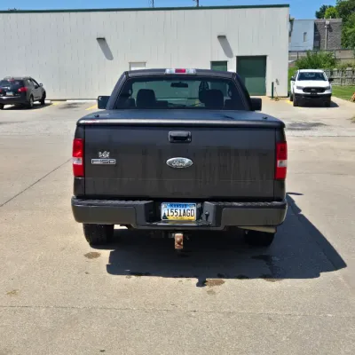 Sale Photo Thumbnail #4: 131,521 miles 
4 Door
Manual Windows and locks
Cruise
Tonneau cover
Bedliner
Newer tires with lots of tread

Check Engine light and brake lights are on.  Runs and drives well.