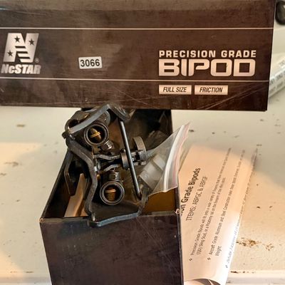 Sale Photo Thumbnail #392: This is a full size, friction, precision grade bipod by NcStar. New in original box.